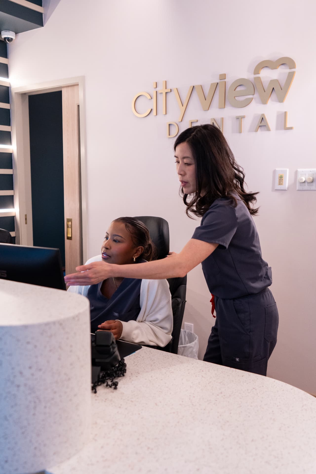 Cityview Dental team at the front reception desk